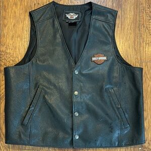 Harley Davidson leather button up vest. Great shape, lightly used.